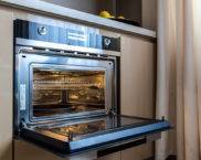 Oven with microwave function