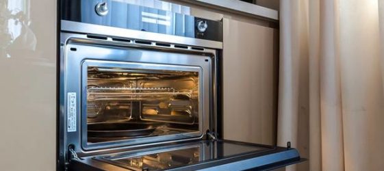 Oven with microwave function