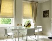 Roman blinds on plastic windows: photo